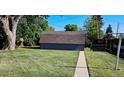 View of backyard storage shed and fenced yard, providing additional storage at 5567 E Asbury Ave, Denver, CO 80222