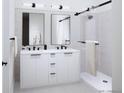 Elegant bathroom featuring a double vanity, modern fixtures, and a walk-in shower at 5770 W 92Nd Ave, Westminster, CO 80031