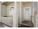 Front entrance with porch and columns at 21792 Silver Meadow Ln, Parker, CO 80138