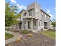 Charming two-story home with stone accents, well-maintained landscaping and inviting curb appeal at 23615 E 5Th Pl, Aurora, CO 80018