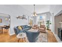 Comfortable living room with stylish furniture and lots of light for relaxing and entertaining at 1300 Cherry St, Denver, CO 80220