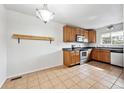 Bright kitchen featuring stainless steel appliances and ample cabinet space at 8460 Decatur St # 138, Westminster, CO 80031