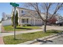 Well maintained two-story home with manicured lawn on a beautiful street at 21642 E 55Th Ave, Denver, CO 80249