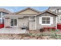 Cozy backyard with a small storage shed and deck, offering a private outdoor space at 2741 Poplar Grove Pl, Castle Rock, CO 80109