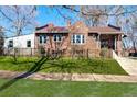 Charming brick home with a fenced yard at 3525 E 7Th Avenue Pkwy, Denver, CO 80206