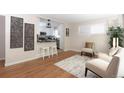 Open living area with views of the updated kitchen and stylish decor at 10420 Marion St, Northglenn, CO 80233
