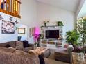 Bright and spacious living room with high ceilings and decorative features at 20391 E 42Nd Ave, Denver, CO 80249