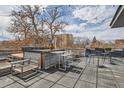 A beautifully appointed rooftop deck is the perfect place to relax and unwind with breathtaking skyline views at 500 E 11Th Ave # 305, Denver, CO 80203