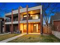 Stunning three-story exterior showcasing brick accents, multiple balconies, and a well-manicured lawn at 3928 Vrain St, Denver, CO 80212