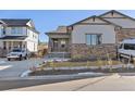 Charming ranch home with stone and siding exterior at 17412 W 93Rd Pl, Arvada, CO 80007