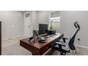 Bright home office with modern desk and chair at 23998 E Atlantic Pl, Aurora, CO 80018