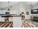 Modern kitchen with stainless steel appliances, granite countertops, and an open floor plan at 3252 E 103Rd Dr # 708, Denver, CO 80229