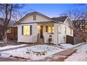 Charming home exterior with a well-maintained yard and inviting entrance at 1901 S Lincoln St, Denver, CO 80210