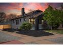 Inviting home featuring modern exterior paint, tidy landscaping, and a cozy, welcoming ambiance at 3105 N Elizabeth St, Denver, CO 80205