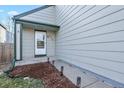 House's front entrance with white door and small walkway at 5428 W 115Th Dr, Westminster, CO 80020