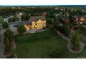 Charming two-story home with a three car garage and large, landscaped yard in a Gathering-friendly neighborhood at 5605 Killen Ave, Castle Rock, CO 80104