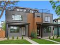 Modern two-story home featuring a rooftop terrace and contemporary design at 2450 S Cherokee St, Denver, CO 80223