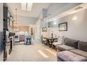 Bright living room featuring neutral tones, sleek fireplace, and cozy seating area for relaxing and entertaining at 2800 W Centennial Dr # I, Littleton, CO 80123