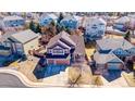 An aerial view of a two-story home nestled in a well-maintained neighborhood at 22678 E Lake Pl, Centennial, CO 80015