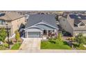 Beautiful aerial view of the home showcasing a spacious yard and neighborhood at 14066 Ivanhoe Ct, Thornton, CO 80602