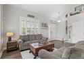 Cozy living room with ample seating and natural light at 688 Cinnabar Ln, Castle Rock, CO 80108