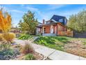 Charming brick home with updated exterior details and landscaping at 3267 Stuart St, Denver, CO 80212