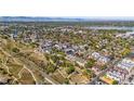 Stunning aerial view of the neighborhood showcasing a mix of residential and commercial properties near Sloan's Lake at 1287 Quitman St, Denver, CO 80204