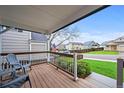 Cozy front porch with seating, perfect for enjoying the neighborhood views at 7927 Elmwood St, Littleton, CO 80125