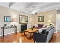 Charming living area with hardwood floors, fireplace, and stylish furnishings at 7877 E Mississippi Ave # 208, Denver, CO 80247