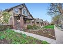 Attractive home with a landscaped front yard in a quiet neighborhood at 2039 S Corona St, Denver, CO 80210