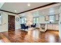 Bright living room with hardwood floors, natural light, and modern decor at 2039 S Corona St, Denver, CO 80210