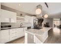 Modern kitchen with granite countertops, stainless steel appliances, and bright lighting at 4457 Wyandot St, Denver, CO 80211