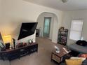 Comfortable living room featuring carpeted floors, and plenty of natural light at 2469 Ames St, Edgewater, CO 80214
