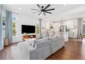 Bright and open living room with a comfortable sofa and modern decor at 10254 Worchester St, Commerce City, CO 80022