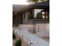 Charming home featuring stylish curb appeal and a beautifully landscaped walkway leading to the front entrance at 199 S Ivy St, Denver, CO 80224