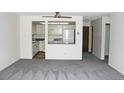 Open-concept layout with a view into the kitchen area, great for entertaining at 13952 E Marina Dr # 304, Aurora, CO 80014
