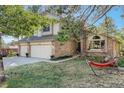 Lovely exterior view of a home with mature trees, an American flag, and an inviting hammock at 25875 Buffalo Ln, Golden, CO 80401