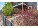 Inviting home exterior with manicured landscaping and a charming walkway leading to the entrance at 8982 Delacorte St, Littleton, CO 80129