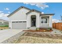 Charming single-story home with a two-car garage and manicured front yard at 1613 Bloom St, Brighton, CO 80601