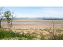 Scenic view of surrounding land and Rocky Mountains in the distance at 4100 Eclectic St, Watkins, CO 80137
