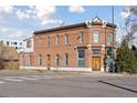 Historic brick building with charming architectural details and a corner lot at 701 W 6Th Ave, Denver, CO 80204