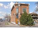 1890 brick building featuring corner lot, crosswalk, and street view at 701 W 6Th Ave, Denver, CO 80204