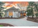 Attractive single-Gathering home with brick exterior, mature trees, and well-maintained landscaping, creating a serene setting at 101 Glenmoor Ln, Cherry Hills Village, CO 80113