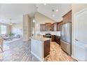 Stylish kitchen with stainless steel appliances, granite countertops, and ample cabinet space at 31101 Black Eagle Dr # 202, Evergreen, CO 80439