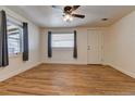 Inviting living room boasts hardwood floors and natural light at 6670 Hooker St, Denver, CO 80221