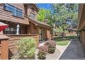 Charming townhome with lush landscaping and a private fenced patio area at 8010 Holland Ct # D, Arvada, CO 80005