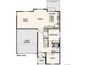 Main level floor plan featuring kitchen, great room, and two-car garage at 1465 Bloom St, Brighton, CO 80601