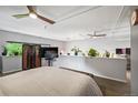 Bright bedroom with a partition, modern decor, natural light and lots of plants at 930 Acoma St # 106, Denver, CO 80204