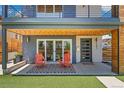 Inviting front porch showcases modern design and a cozy seating area at 3657 Pecos St, Denver, CO 80211