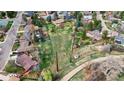 An aerial shot showing the property, neighborhood, and surrounding landscape at 6196 S Rosewood Dr, Littleton, CO 80121
